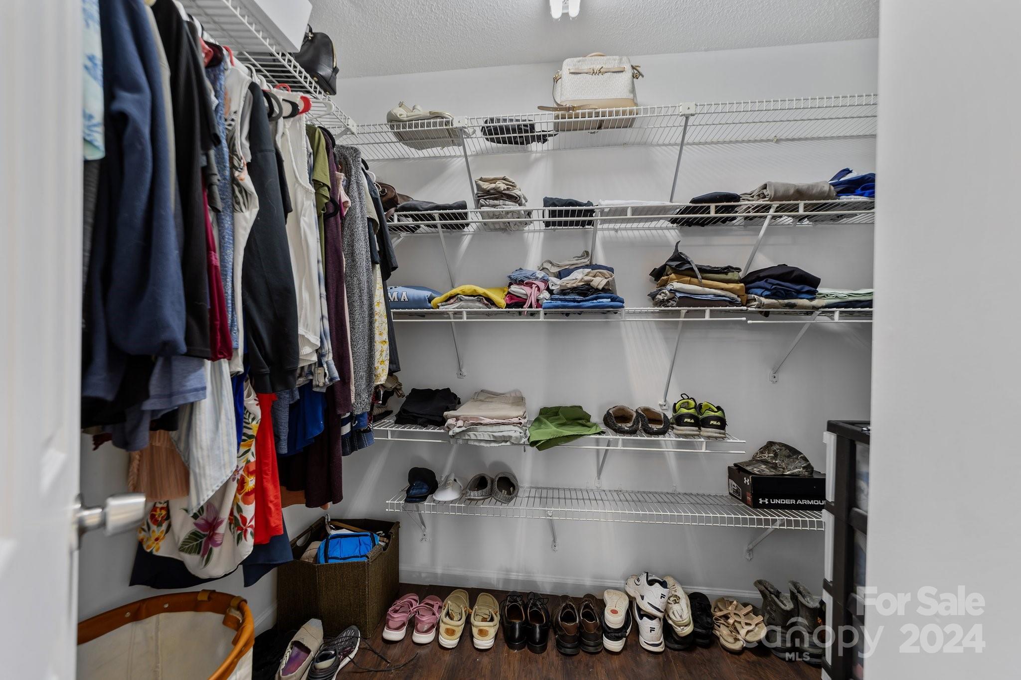 1041 Fairway Ridge Drive Northwest Concord, NC 28027 - Photo 28 of 44 a view of a walk in closet