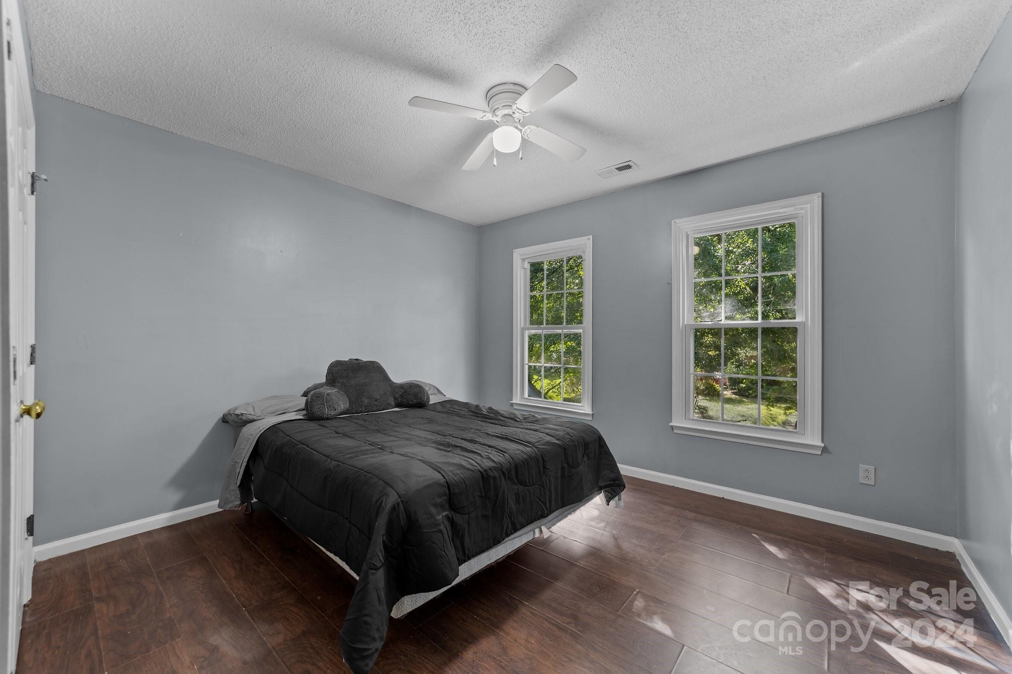 1041 Fairway Ridge Drive Northwest Concord, NC 28027 - Photo 30 of 44 a bedroom with a bed and window