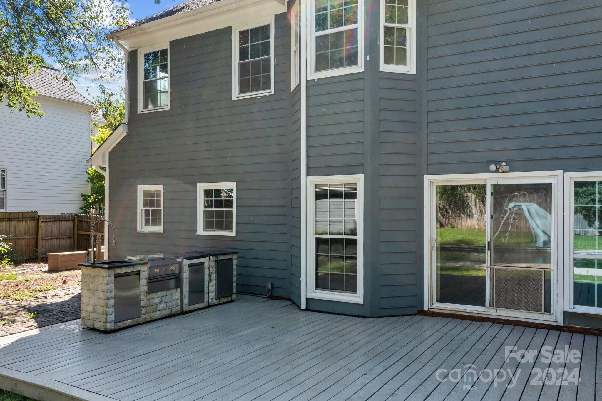1041 Fairway Ridge Drive Northwest Concord, NC 28027 - Photo 42 of 44 a view of a house with a deck