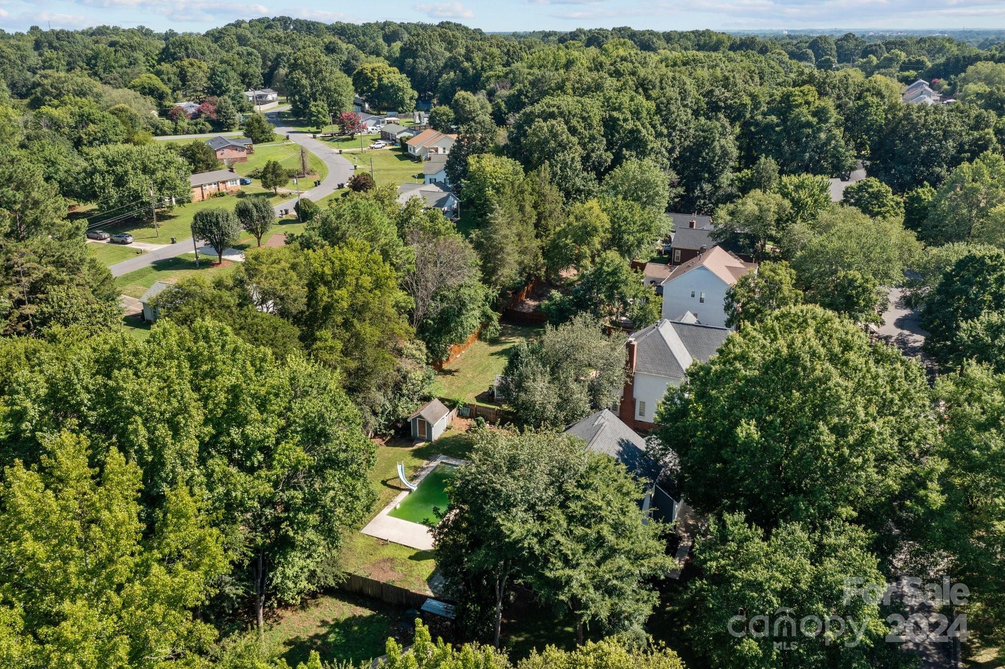 1041 Fairway Ridge Drive Northwest Concord, NC 28027 - Photo 44 of 44 an aerial view of residential house with outdoor space and trees all around