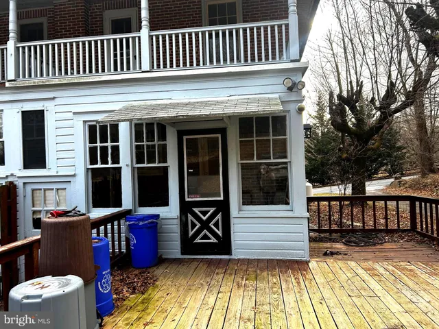 a view of a house with a deck