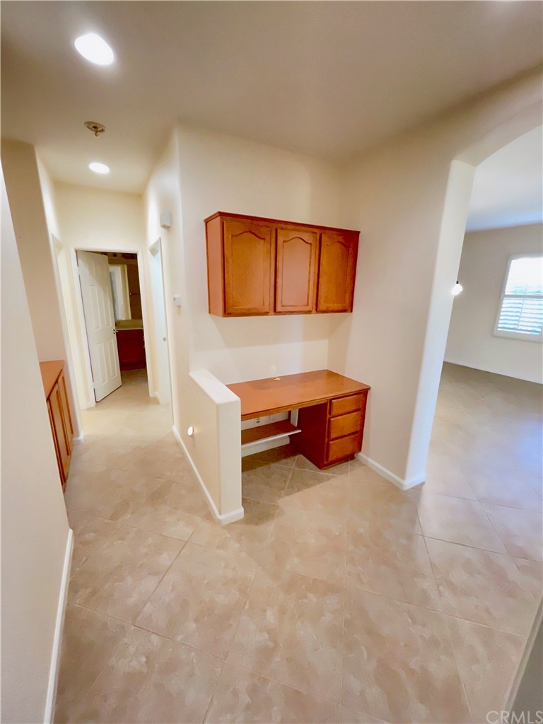 24042 Boulder Oaks Drive Corona, CA 92883 - Photo 4 of 8 a living room with furniture and a window