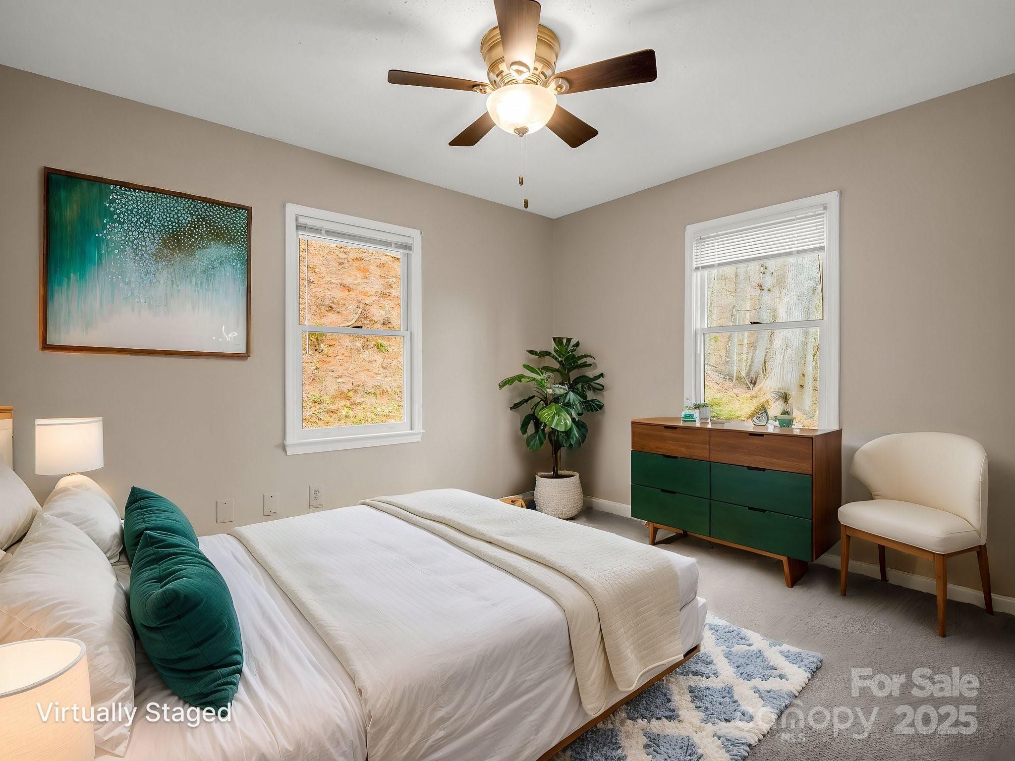 1116 High Vista Drive Mills River, NC 28759 - Photo 22 of 40 a bedroom with a bed and a window