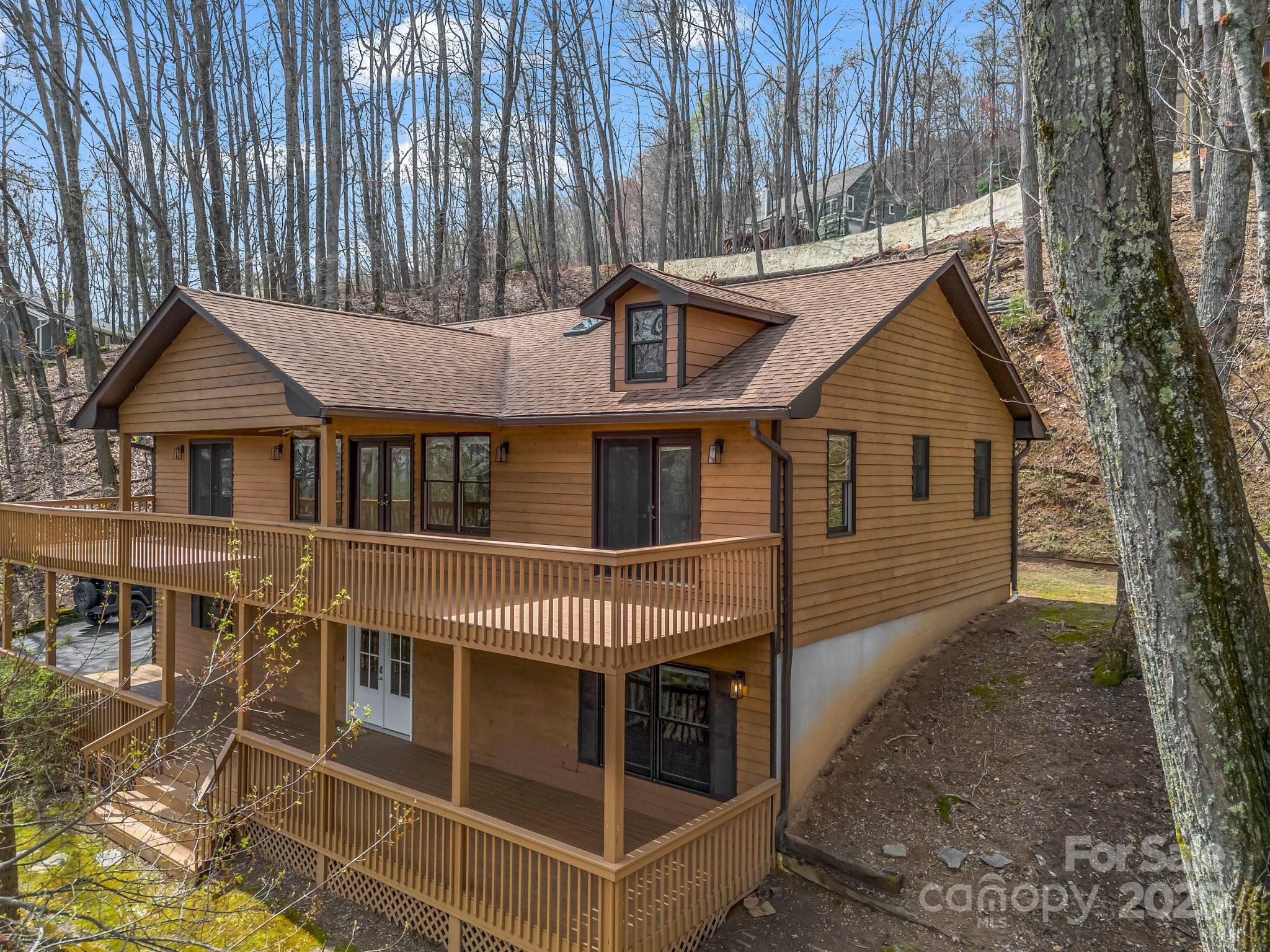 1116 High Vista Drive Mills River, NC 28759 - Photo 3 of 40 a front view of a house with a yard