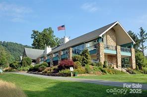 1116 High Vista Drive Mills River, NC 28759 - Photo 39 of 40 a front view of a house with a yard