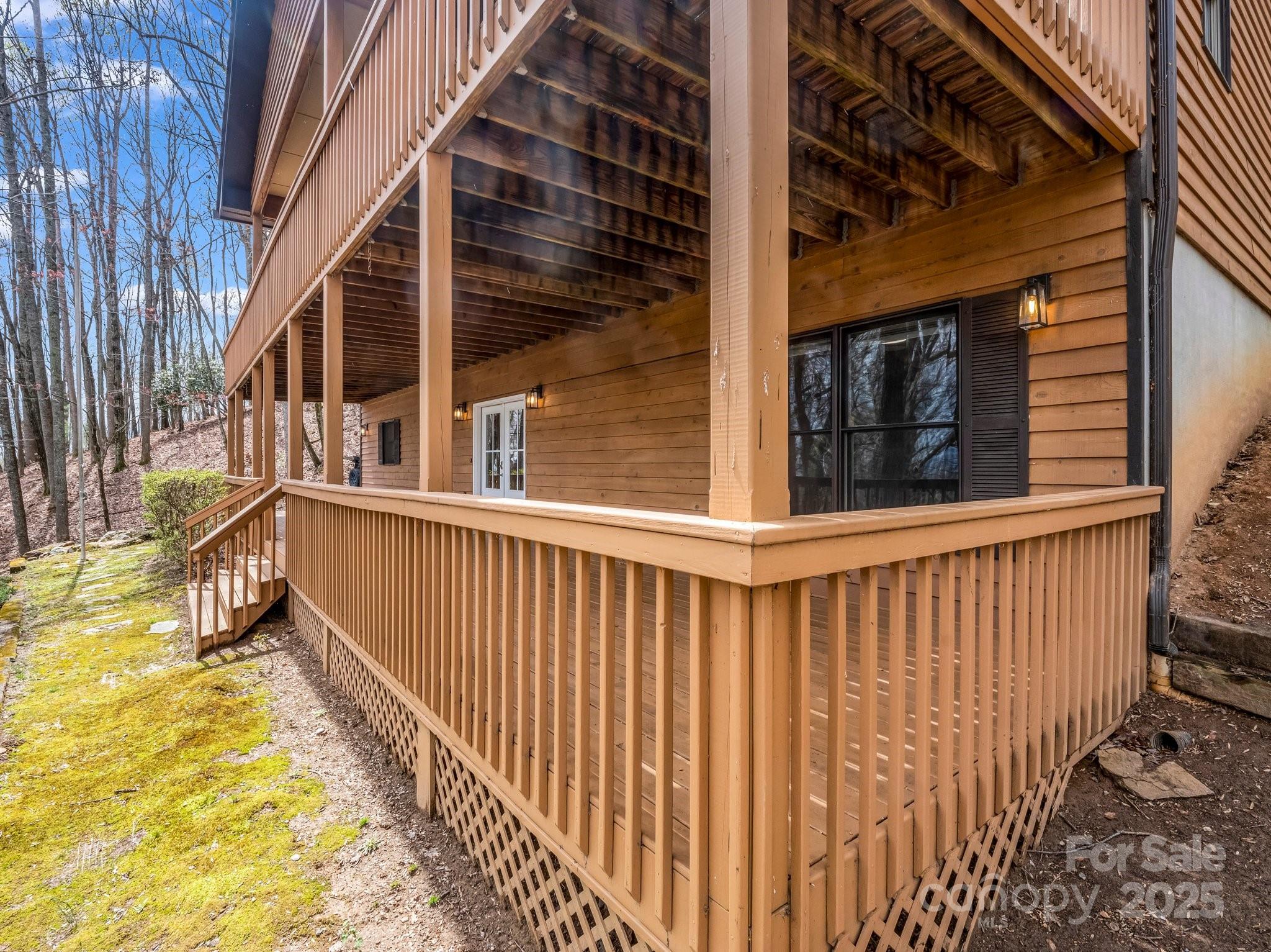 1116 High Vista Drive Mills River, NC 28759 - Photo 8 of 40 a view of a balcony with wooden floor
