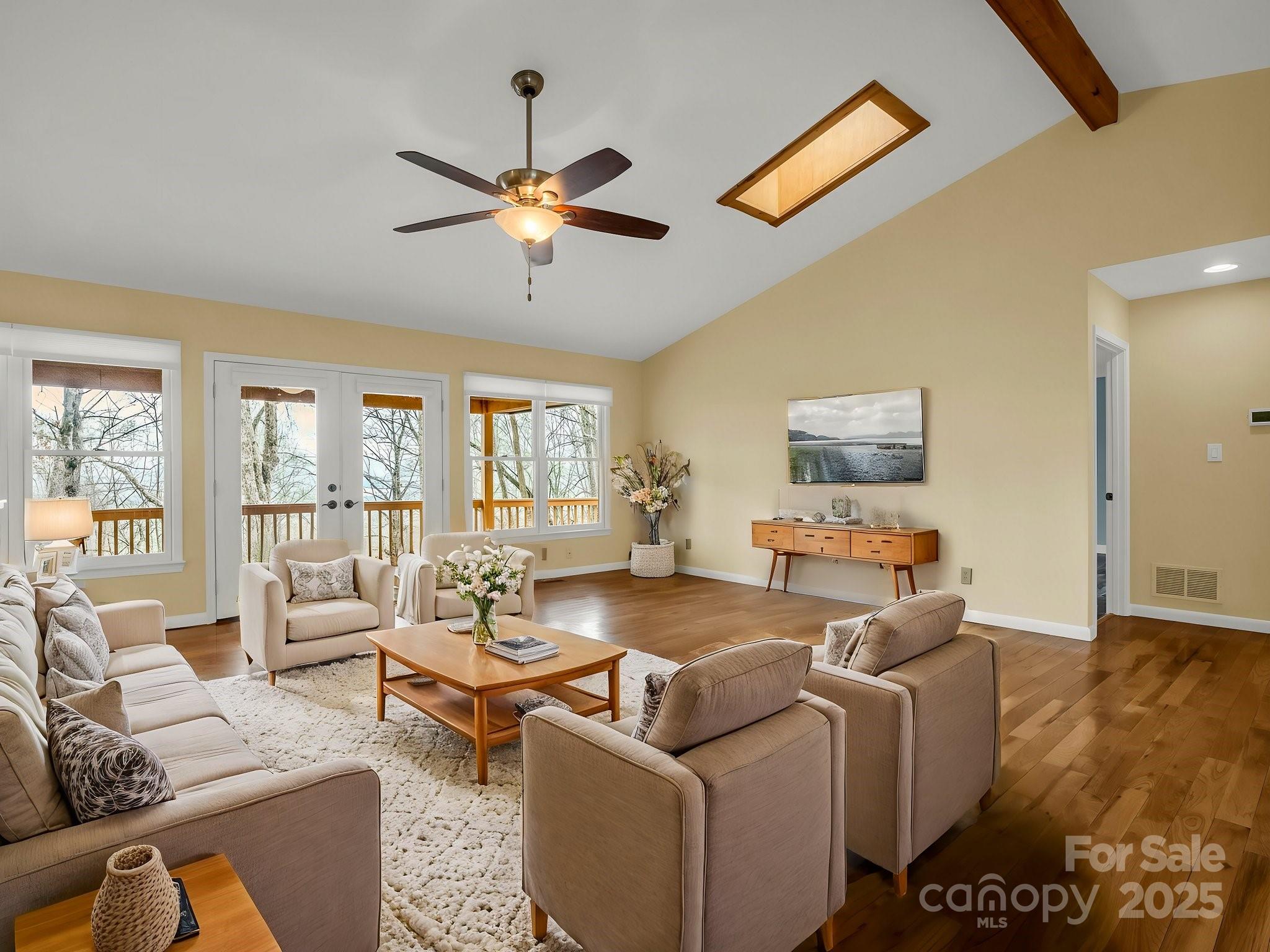 1116 High Vista Drive Mills River, NC 28759 - Photo 10 of 40 a living room with furniture and a flat screen tv