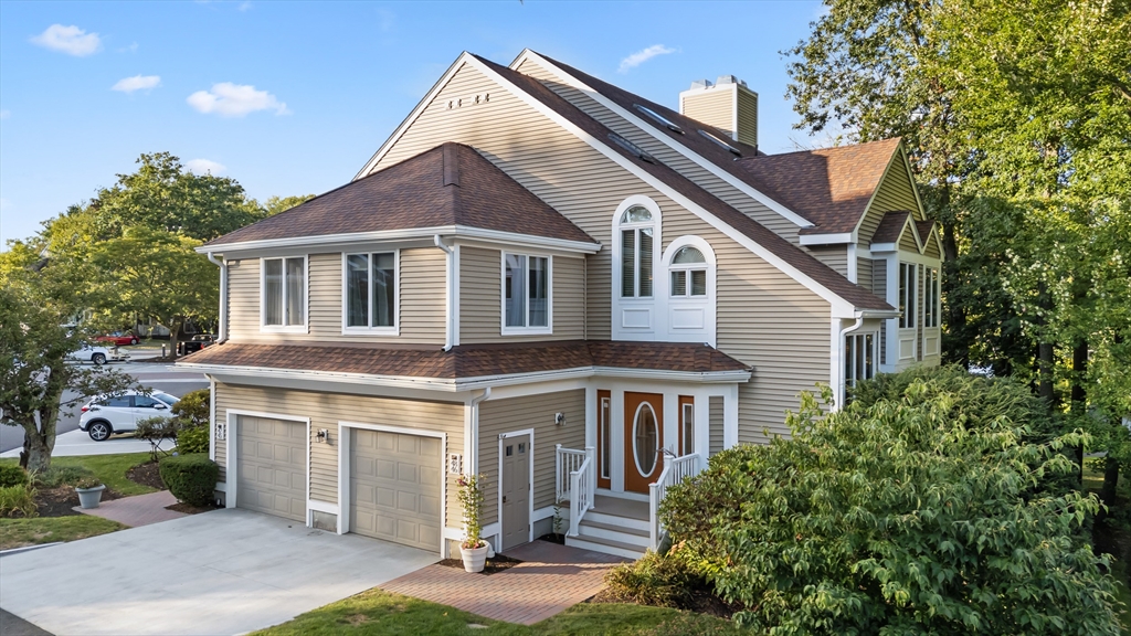 48 Pointe Rok Drive, Unit 48 Worcester, MA 01604 - Photo 1 of 42 a front view of a house with a yard
