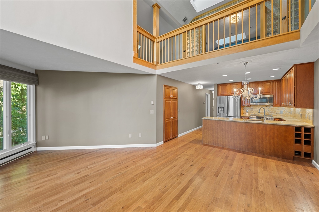 48 Pointe Rok Drive, Unit 48 Worcester, MA 01604 - Photo 11 of 42 a view of an entryway with wooden floor
