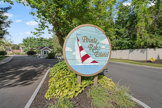 a view of a sign board with a park