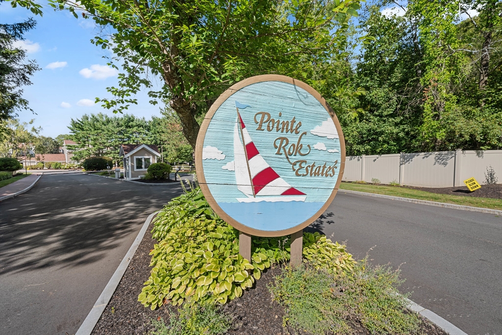 48 Pointe Rok Drive, Unit 48 Worcester, MA 01604 - Photo 26 of 42 a view of a sign board with a park