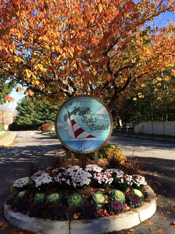 48 Pointe Rok Drive, Unit 48 Worcester, MA 01604 - Photo 34 of 42 a view of a backyard with wooden fence