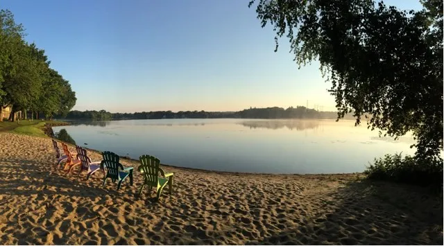 a view of a lake with a outdoor space