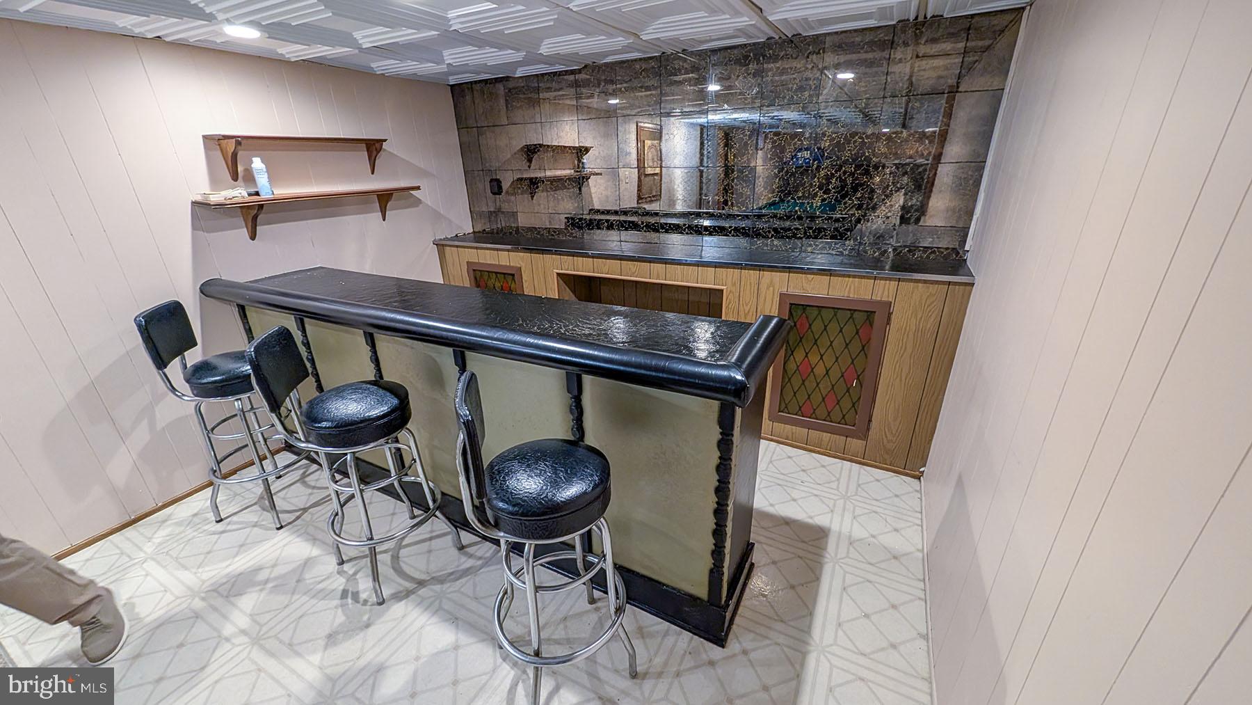 9 Wolfpack Road Hamilton, NJ 08619 - Photo 33 of 57 Stylish basement bar for entertaining.