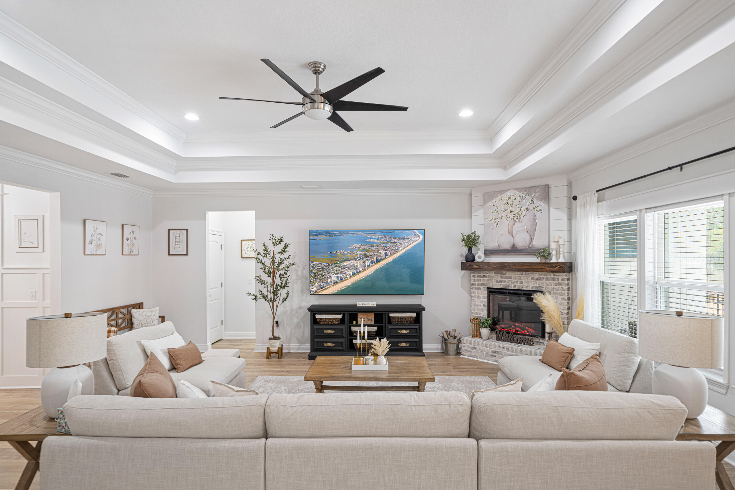52 Conner Circle, Unit LOT 164 Santa Rosa Beach, FL 32459 - Photo 16 of 50 a living room with furniture fireplace and a window
