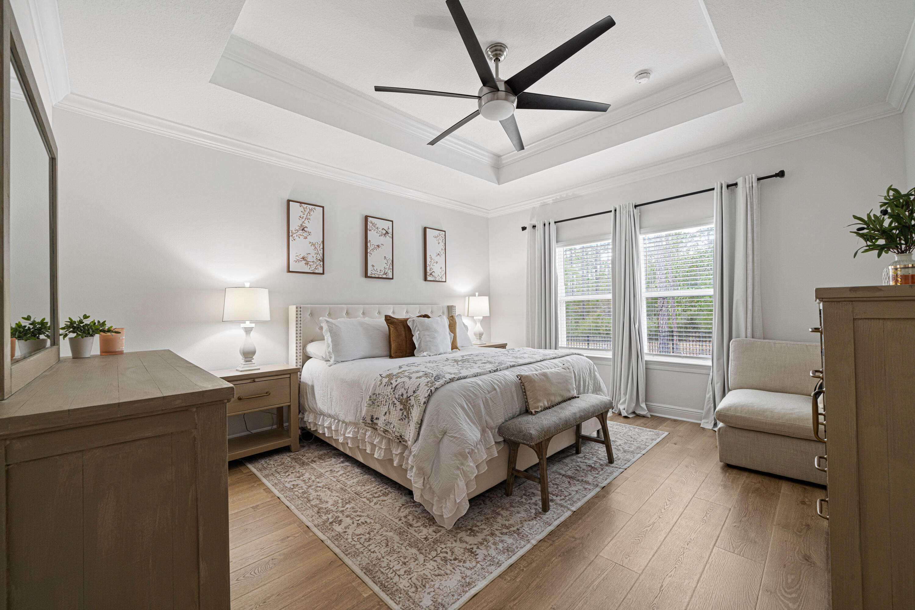 52 Conner Circle, Unit LOT 164 Santa Rosa Beach, FL 32459 - Photo 19 of 50 a spacious bedroom with a bed a couch and a large window