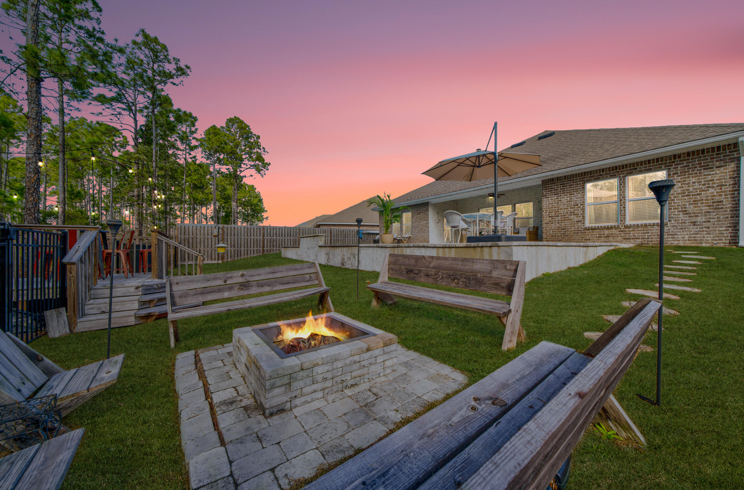 52 Conner Circle, Unit LOT 164 Santa Rosa Beach, FL 32459 - Photo 2 of 50 a view of a house with a yard and a garden