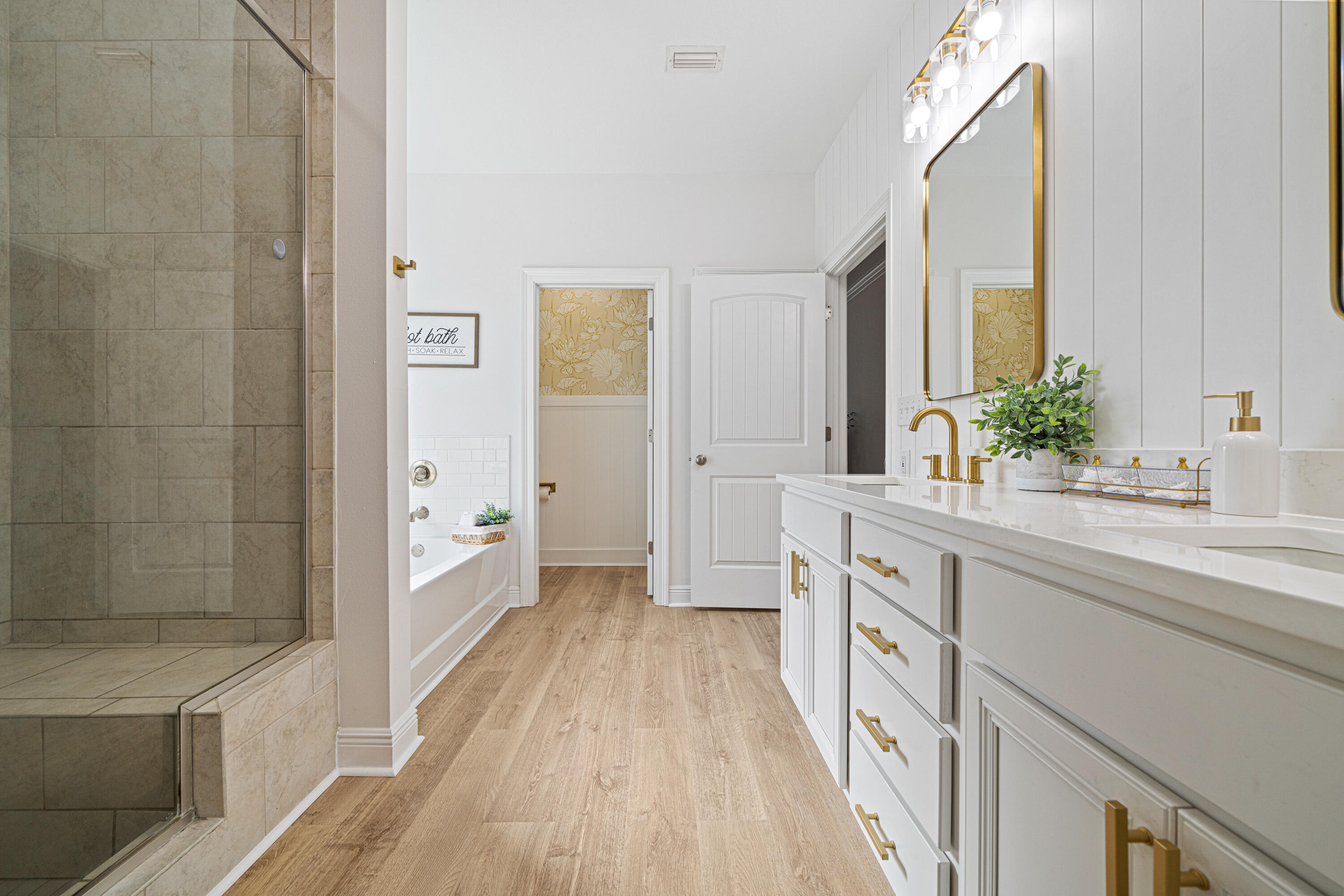 52 Conner Circle, Unit LOT 164 Santa Rosa Beach, FL 32459 - Photo 22 of 50 a spacious bathroom with a double vanity sink a mirror and a shower