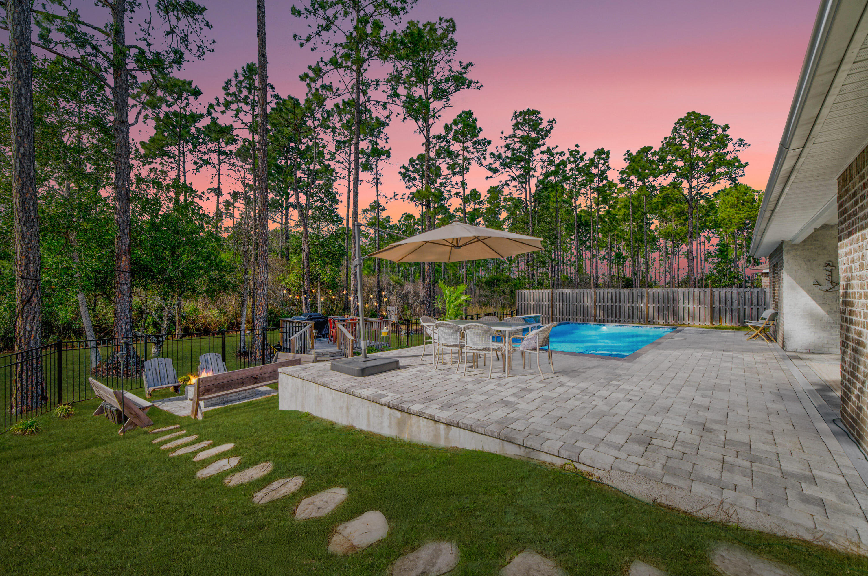 52 Conner Circle, Unit LOT 164 Santa Rosa Beach, FL 32459 - Photo 3 of 50 a view of a park with sitting area and furniture