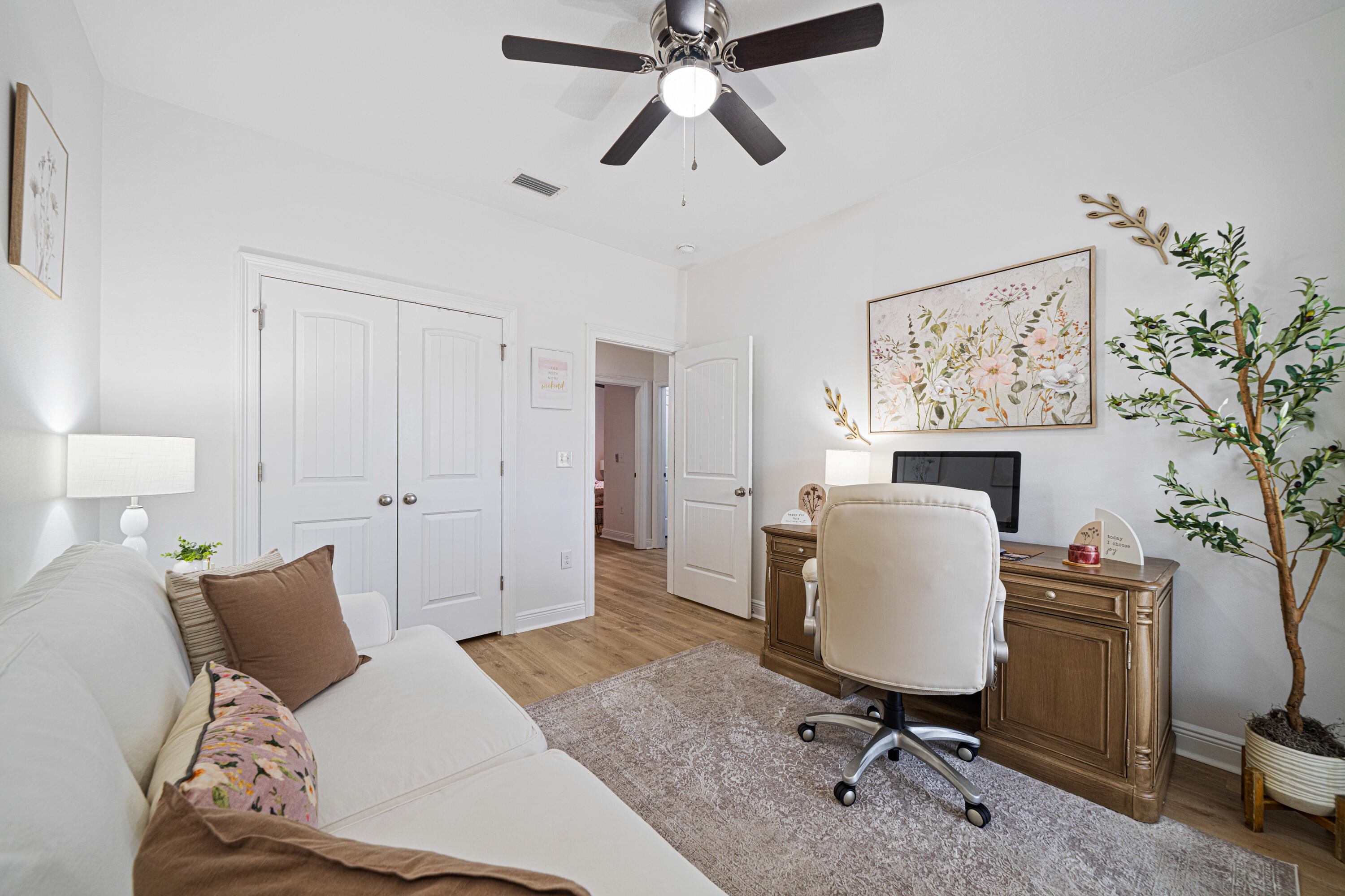 52 Conner Circle, Unit LOT 164 Santa Rosa Beach, FL 32459 - Photo 32 of 50 a view of a workspace with furniture and a chandelier fan