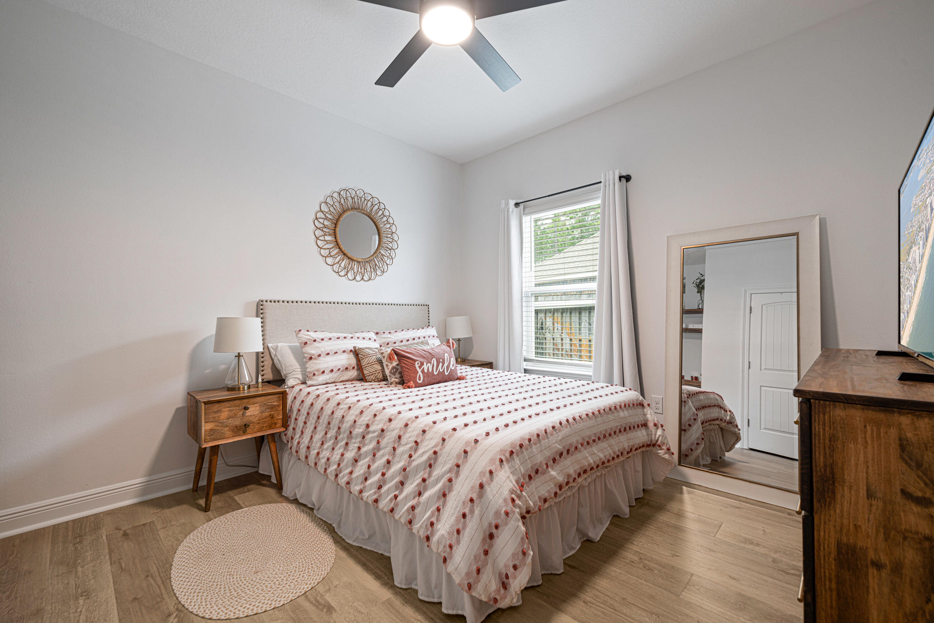 52 Conner Circle, Unit LOT 164 Santa Rosa Beach, FL 32459 - Photo 37 of 50 a bedroom with a bed and wooden floor