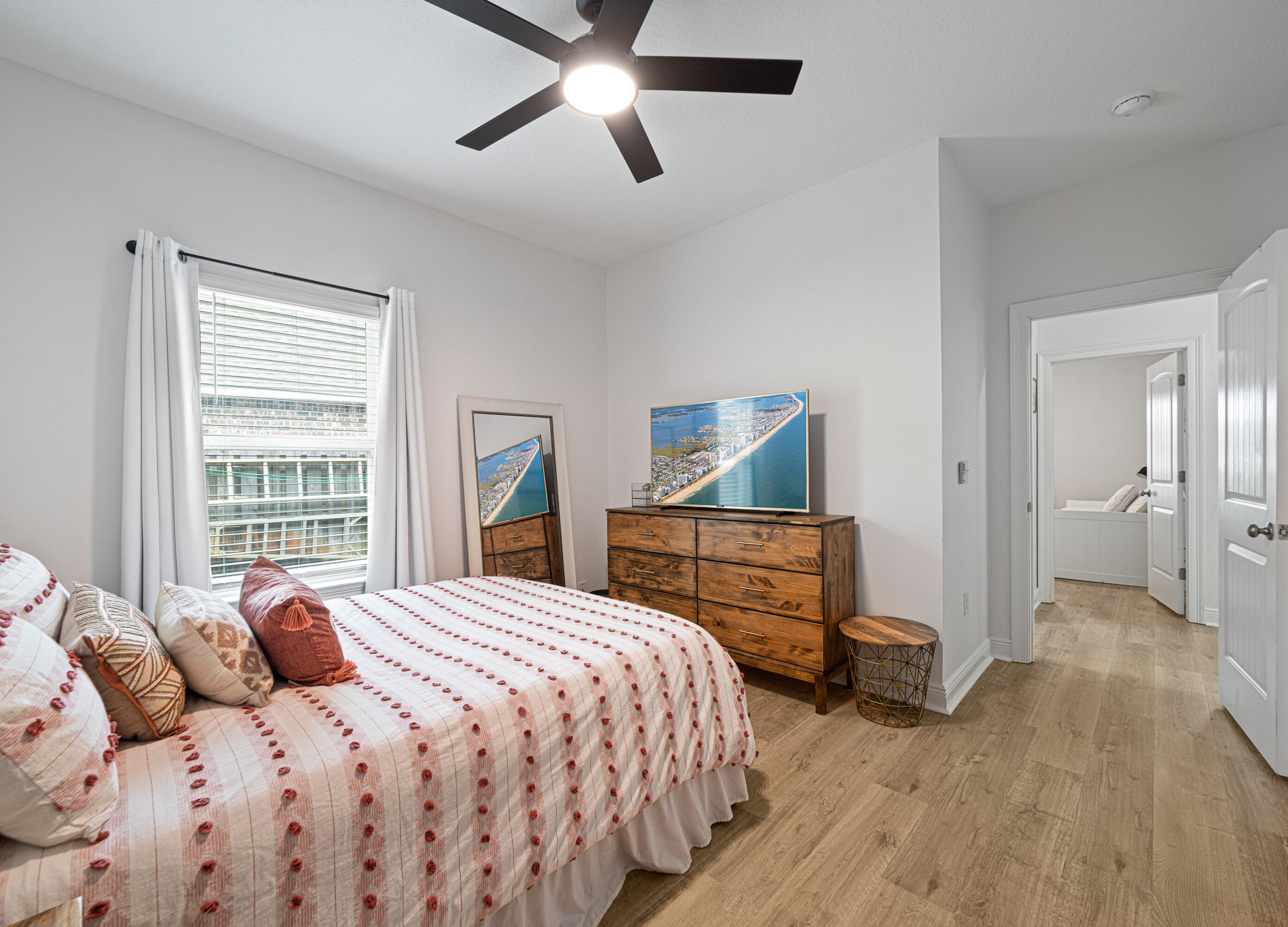 52 Conner Circle, Unit LOT 164 Santa Rosa Beach, FL 32459 - Photo 39 of 50 a bedroom with a bed and wooden floor