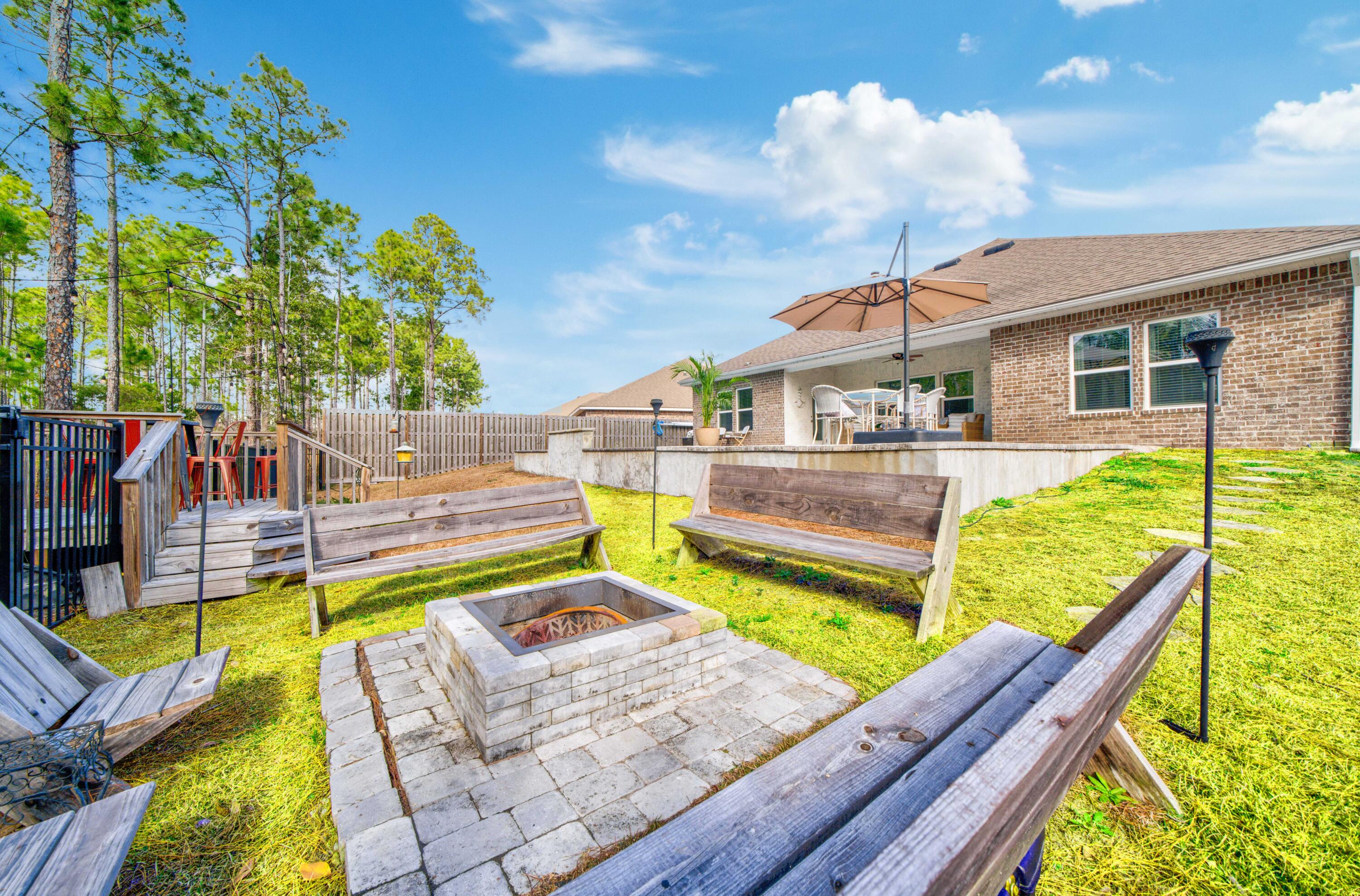 52 Conner Circle, Unit LOT 164 Santa Rosa Beach, FL 32459 - Photo 45 of 50 a view of a swimming pool with a patio