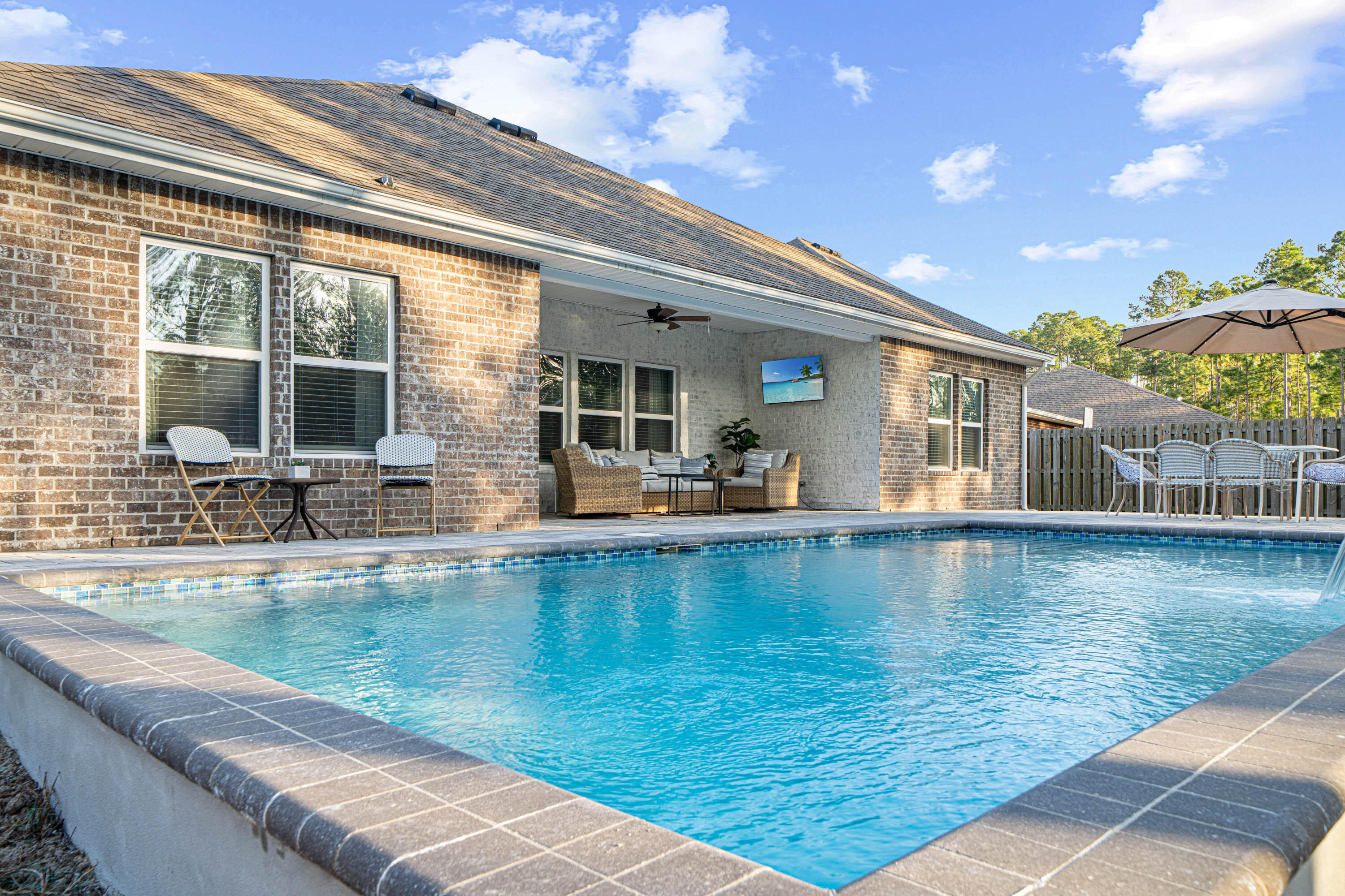 52 Conner Circle, Unit LOT 164 Santa Rosa Beach, FL 32459 - Photo 48 of 50 a view of a swimming pool with outdoor seating