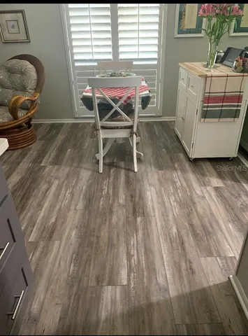 a utility room with sink dryer and washer