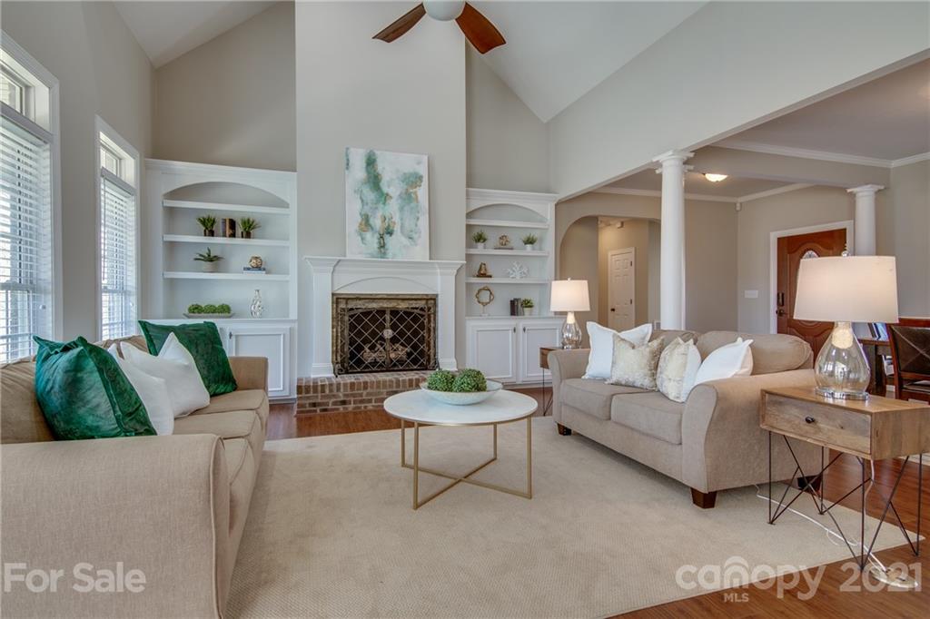 2460 State Rd S-46-883 York, SC 29745 - Photo 11 of 48 a living room with furniture a fireplace and a table