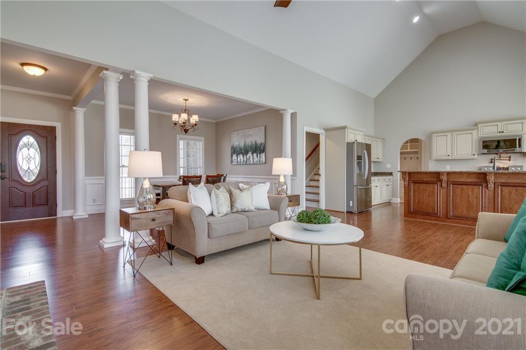 2460 State Rd S-46-883 York, SC 29745 - Photo 12 of 48 a living room with furniture and a wooden floor