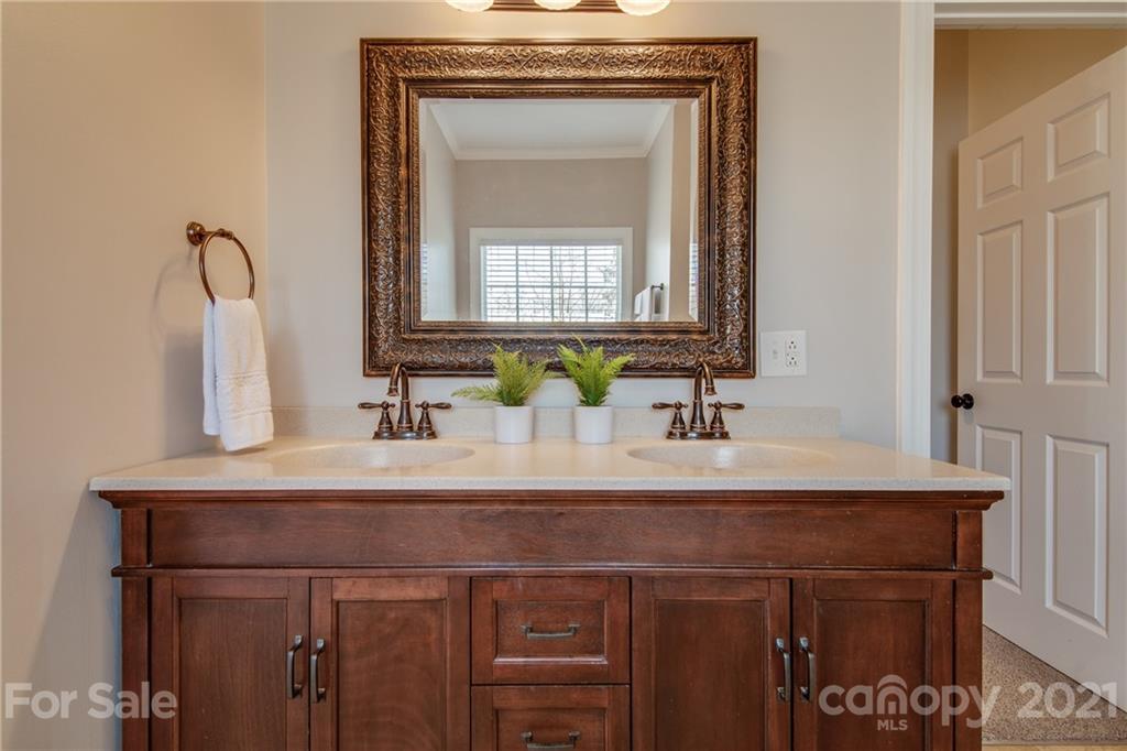 2460 State Rd S-46-883 York, SC 29745 - Photo 23 of 48 a bathroom with a sink vanity and a mirror