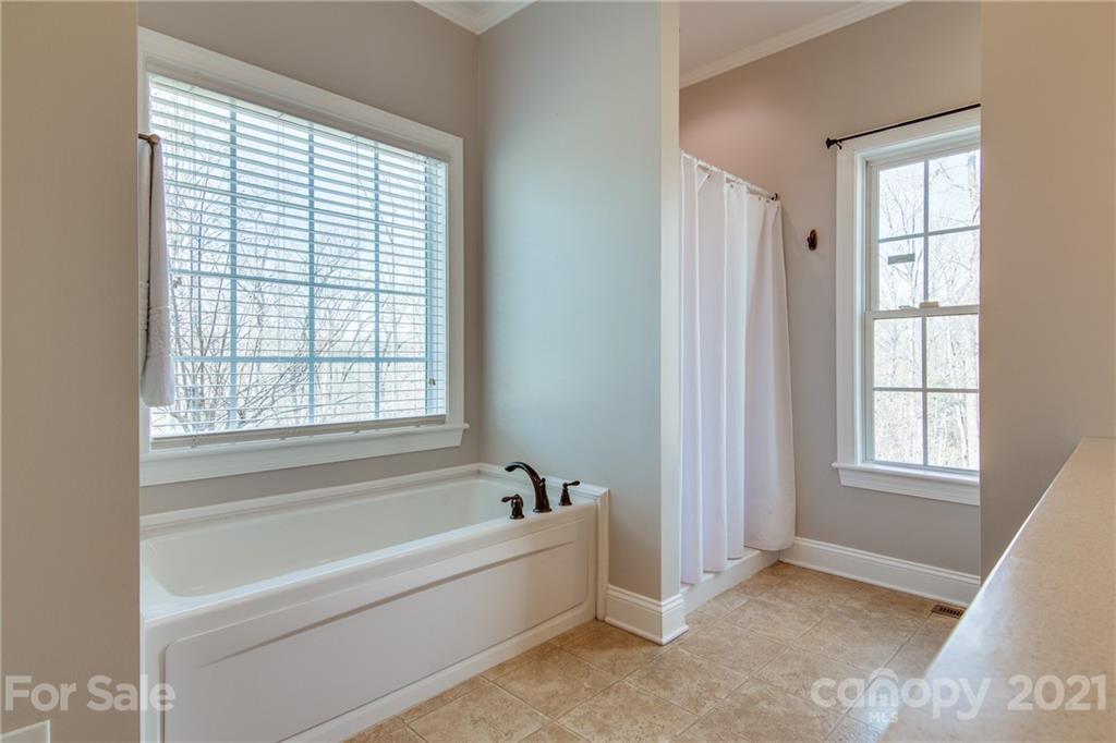 2460 State Rd S-46-883 York, SC 29745 - Photo 24 of 48 a spacious bathroom with bathtub and shower