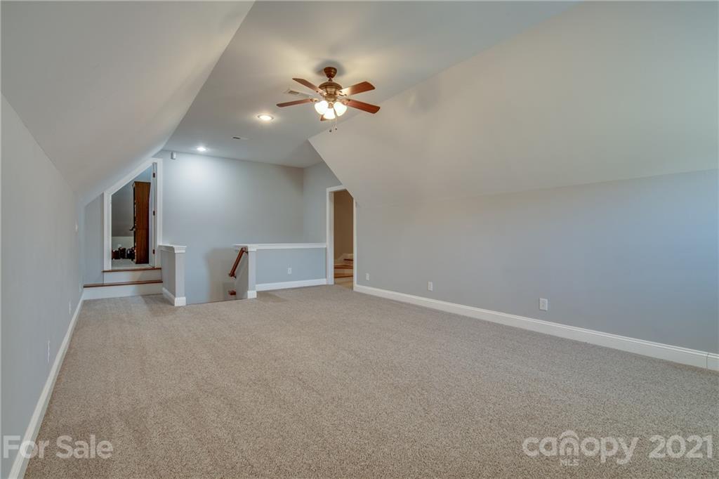 2460 State Rd S-46-883 York, SC 29745 - Photo 35 of 48 a view of an empty room with a chandelier fan
