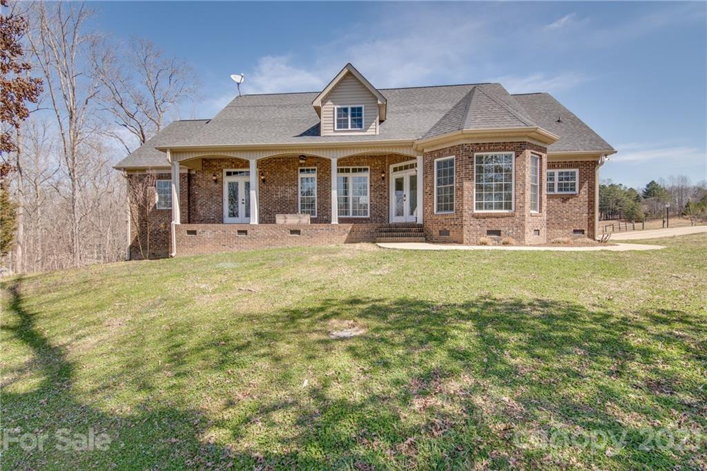 2460 State Rd S-46-883 York, SC 29745 - Photo 44 of 48 a front view of a house with a yard
