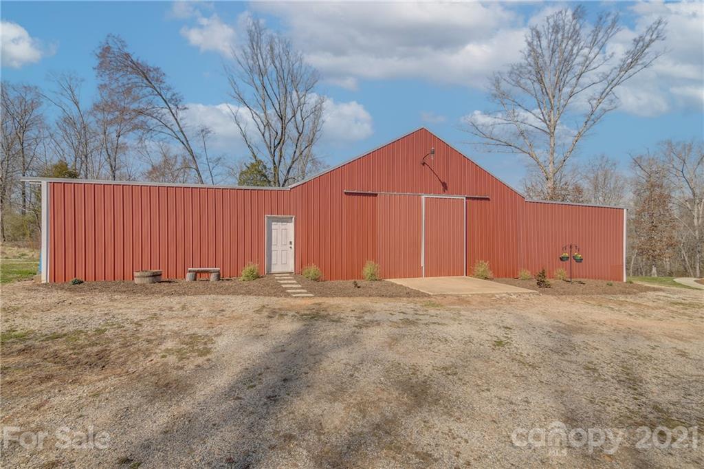2460 State Rd S-46-883 York, SC 29745 - Photo 45 of 48 a front view of a house with a yard and garage