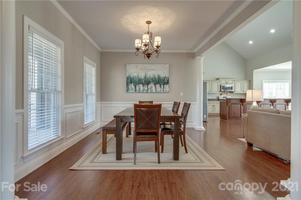 2460 State Rd S-46-883 York, SC 29745 - Photo 7 of 48 a view of a dining room with furniture window and wooden floor