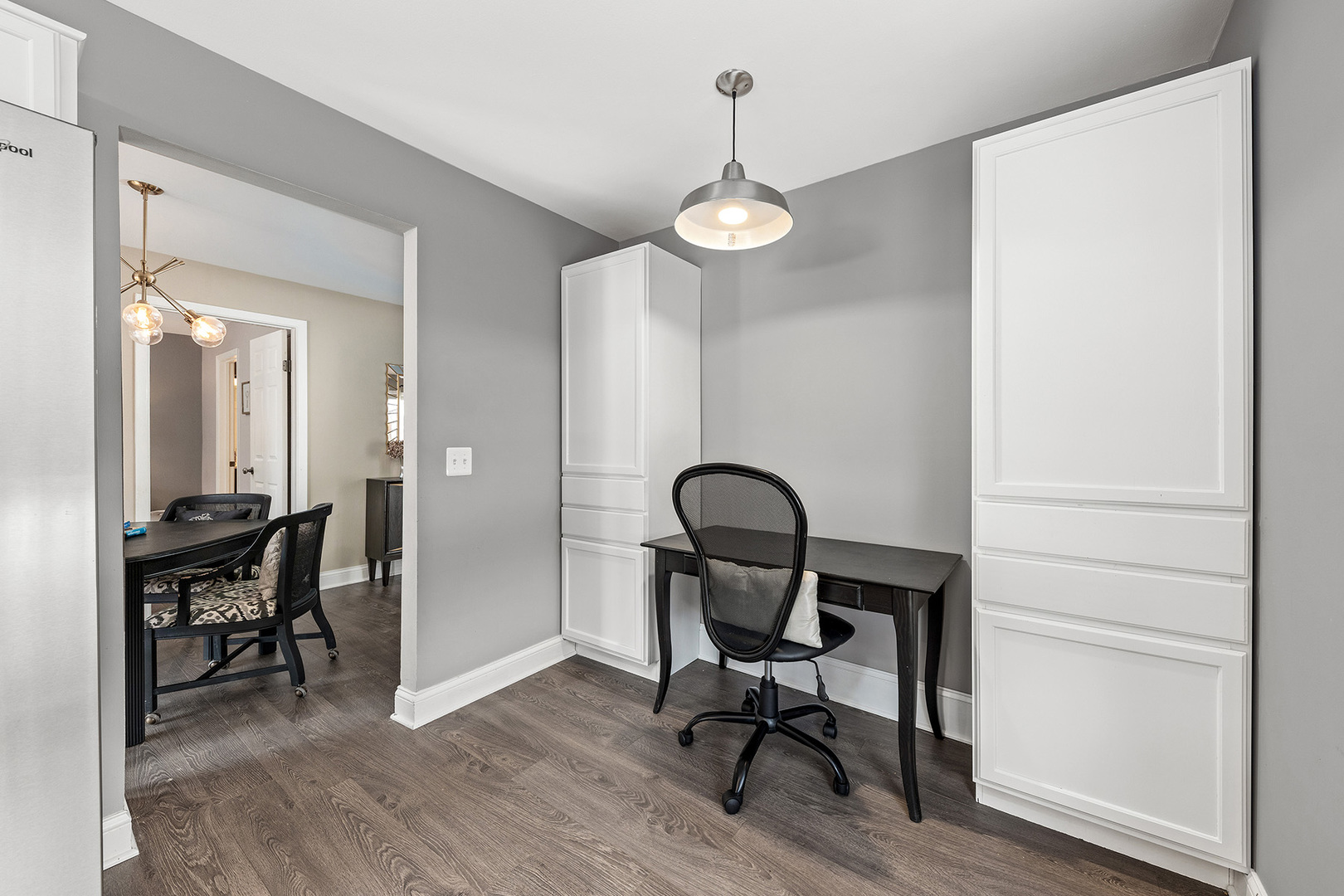 1344 McDowell Road, Unit 101 Naperville, IL 60563 - Photo 11 of 19 a view of a workspace room with wooden floor and lounge chair