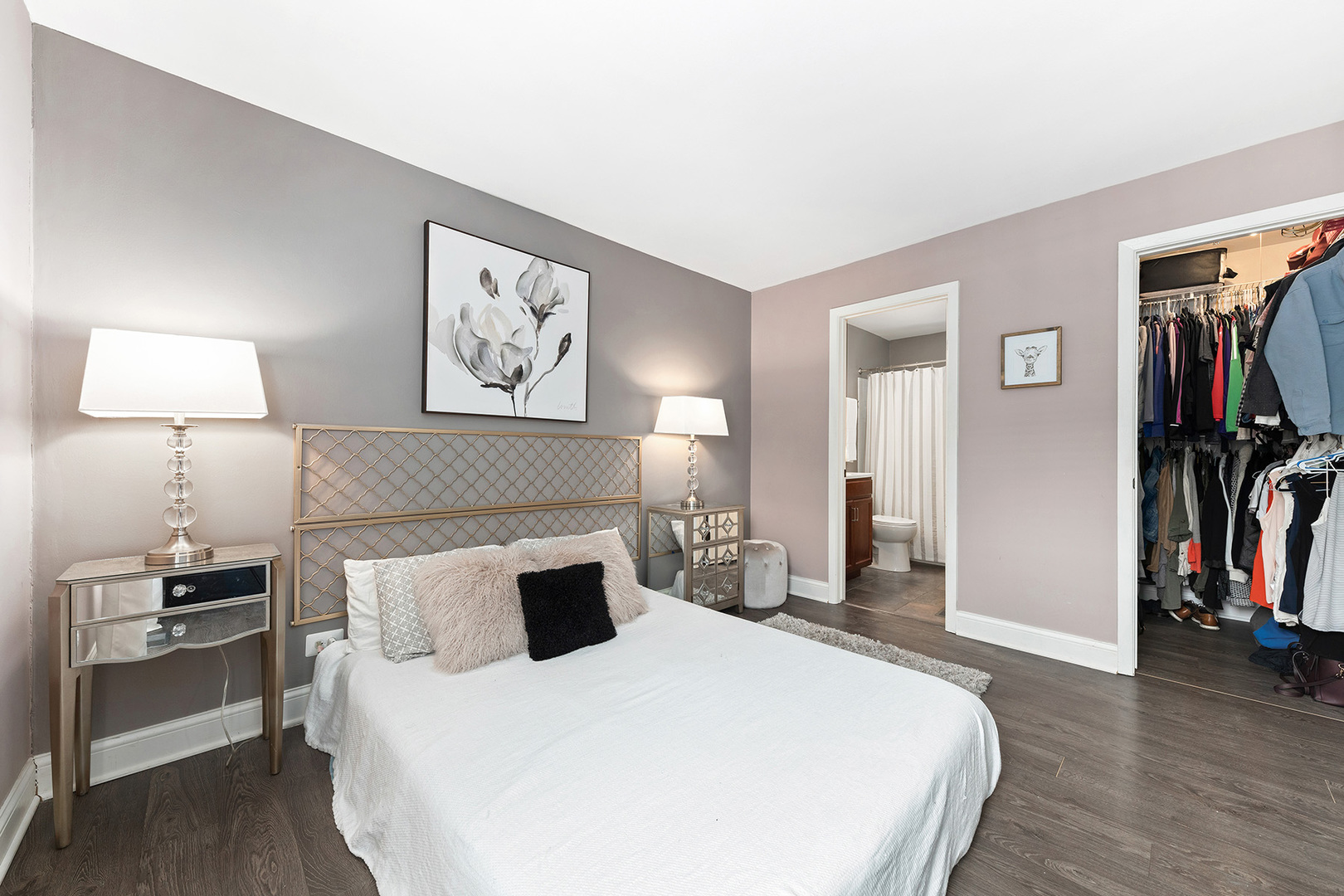 1344 McDowell Road, Unit 101 Naperville, IL 60563 - Photo 13 of 19 a bedroom with a bed and a lamp