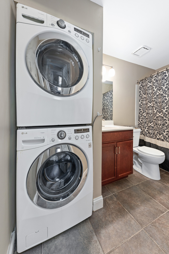 1344 McDowell Road, Unit 101 Naperville, IL 60563 - Photo 15 of 19 a utility room with sink dryer and washer