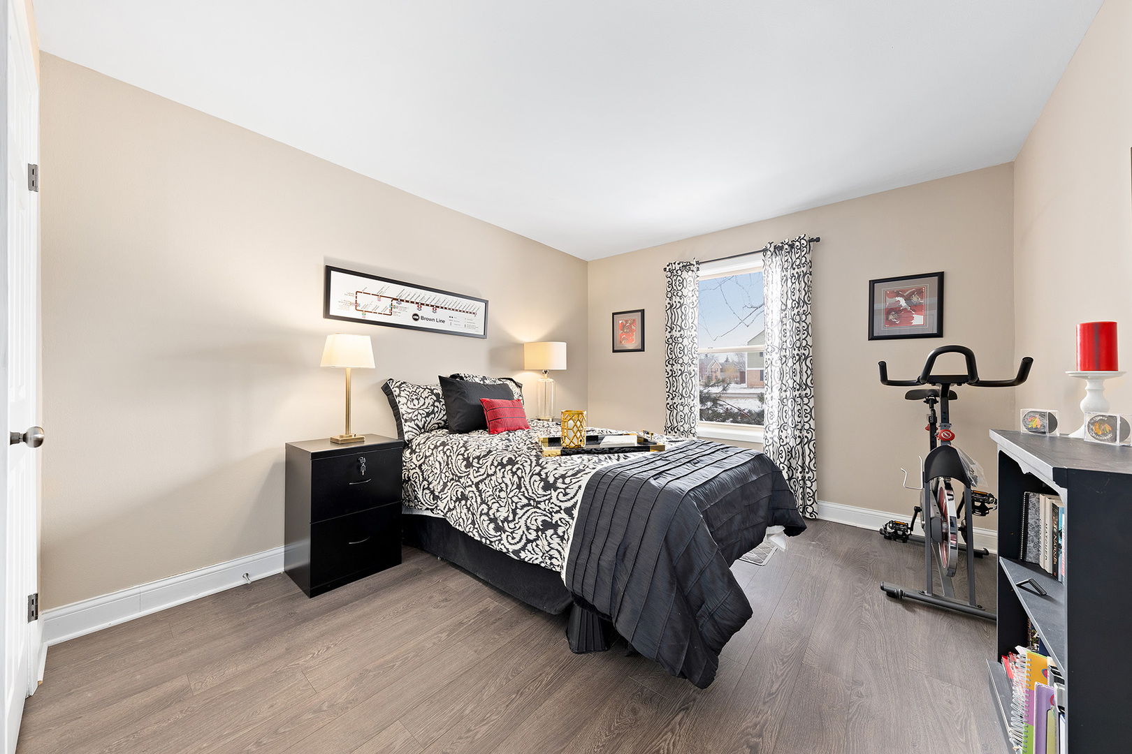 1344 McDowell Road, Unit 101 Naperville, IL 60563 - Photo 17 of 19 a bed room with a bed and a tv