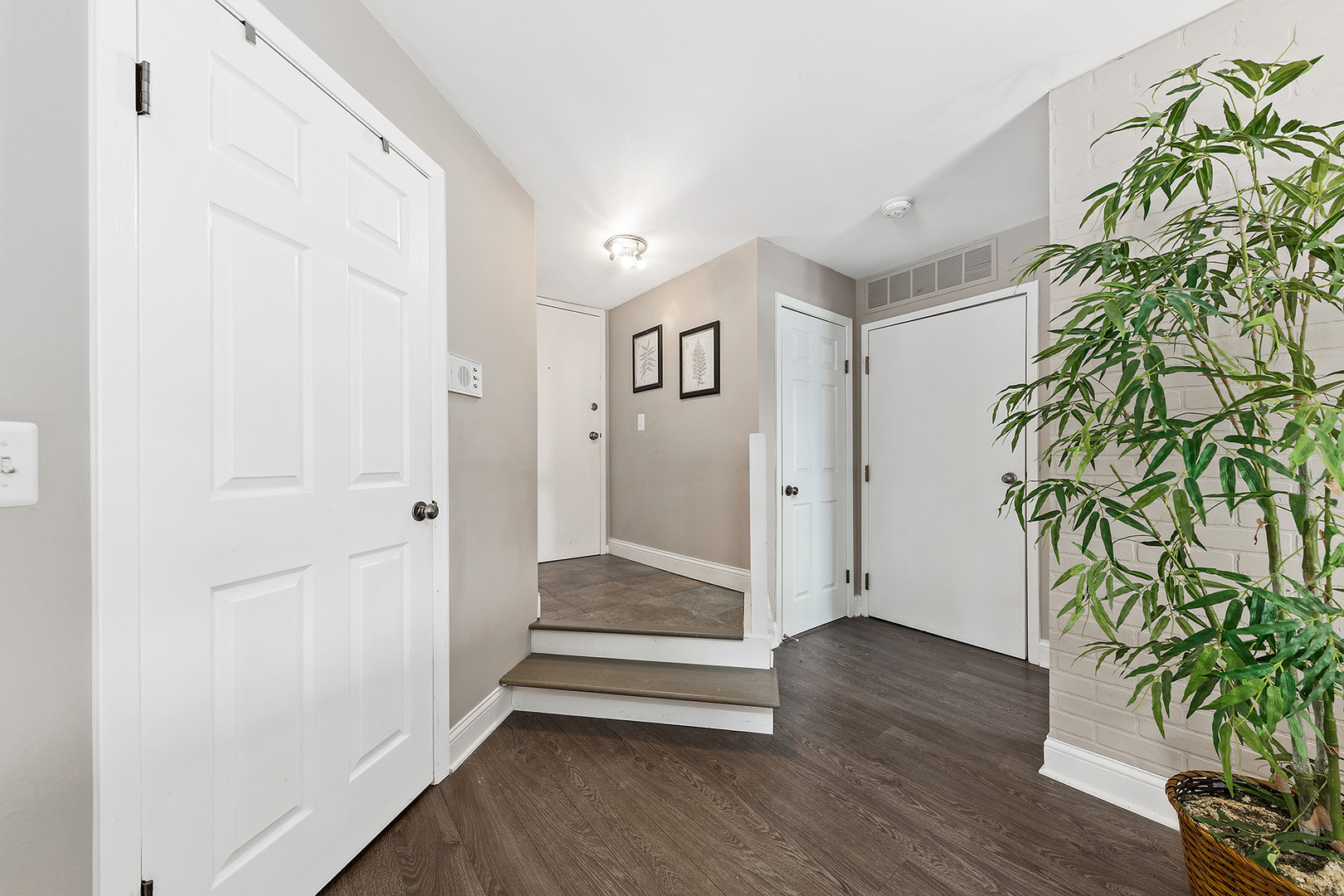 1344 McDowell Road, Unit 101 Naperville, IL 60563 - Photo 5 of 19 a view of entryway with wooden floor