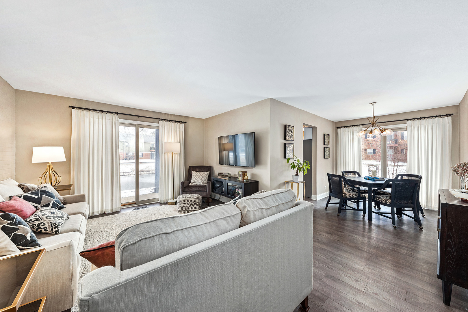 1344 McDowell Road, Unit 101 Naperville, IL 60563 - Photo 6 of 19 a living room with furniture and a wooden floor