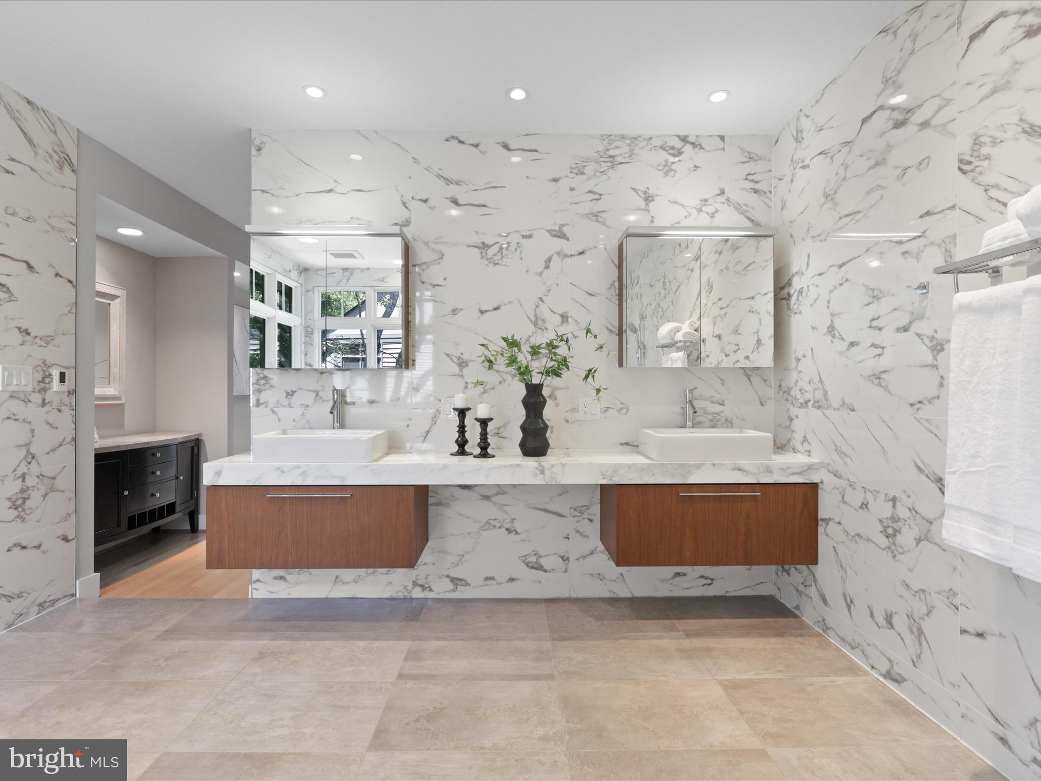 1451 Waterfront Road Reston, VA 20194 - Photo 35 of 76 Floating vanities in primary with custom lighting