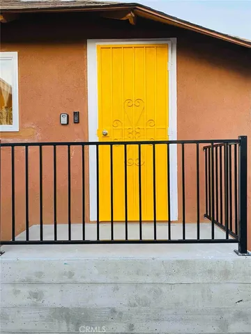 a kitchen with stainless steel appliances granite countertop a stove a refrigerator and a sink