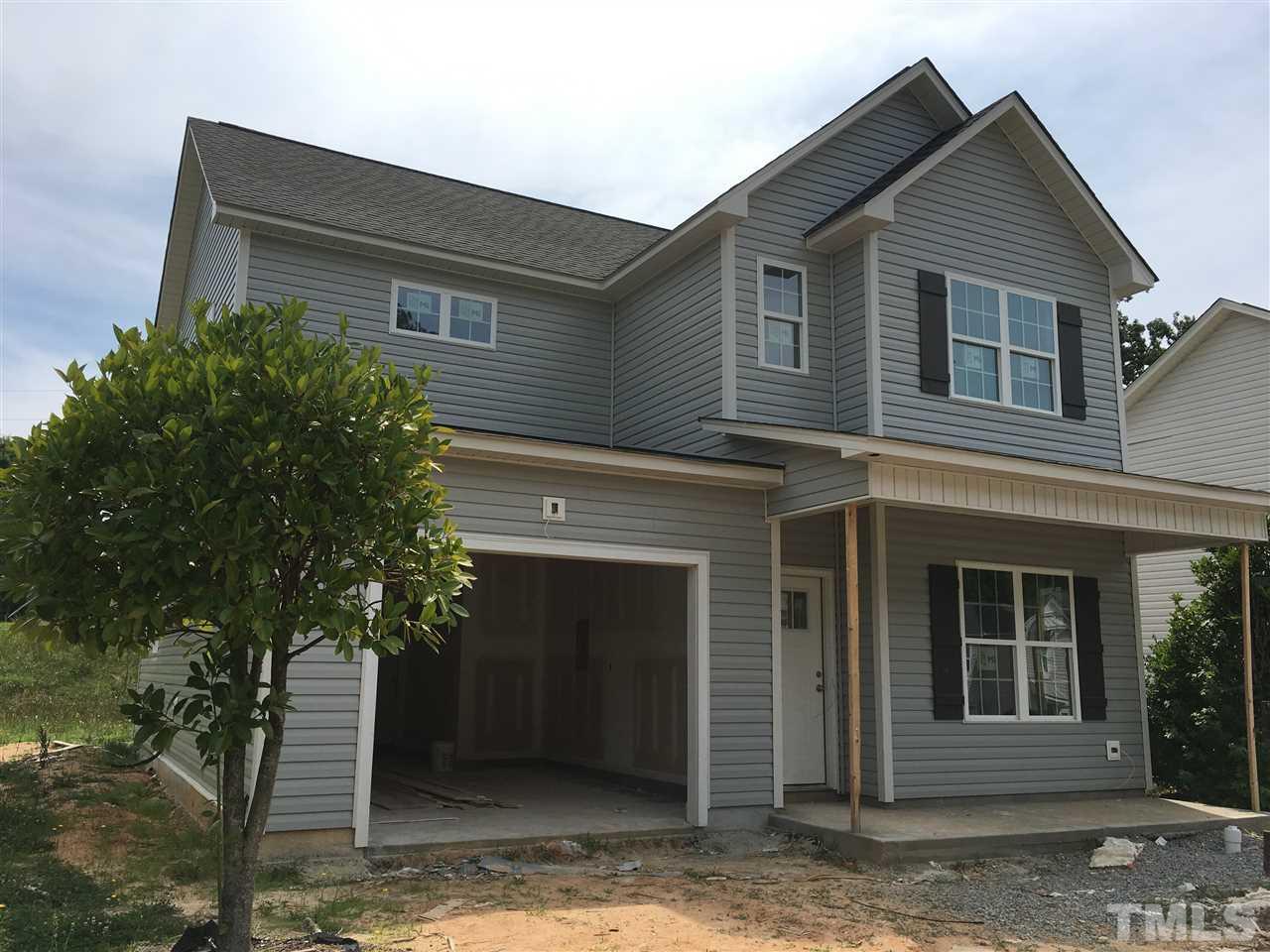 2520 Quarry Ridge Lane Raleigh, NC 27610 - Photo 1 of 12 front view of a house with a small yard