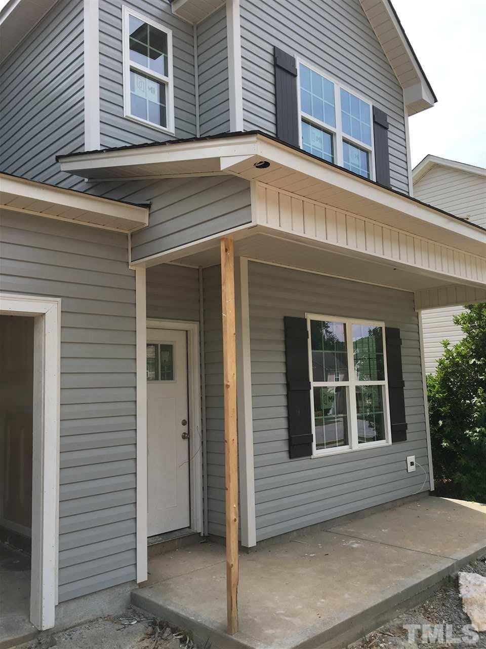 2520 Quarry Ridge Lane Raleigh, NC 27610 - Photo 3 of 12 a view of a house with large windows