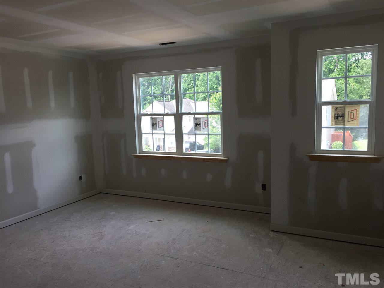 2520 Quarry Ridge Lane Raleigh, NC 27610 - Photo 9 of 12 an empty room with a window