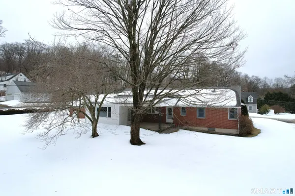 a view of snow on the road