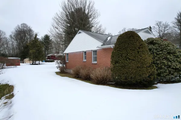 a view of a back yard of the house